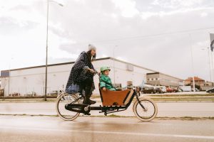 mother and son riding passenger e-bike