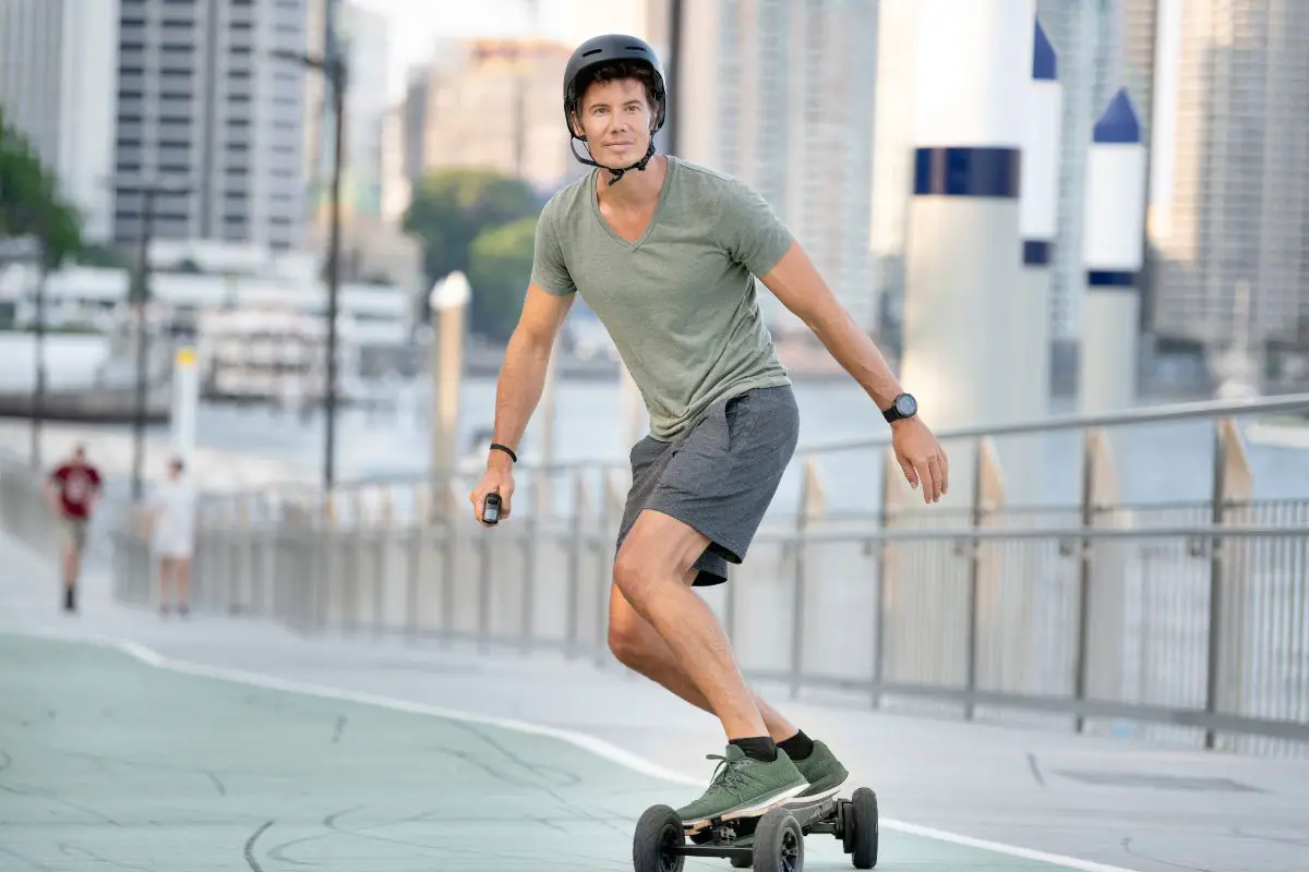man riding boosted board