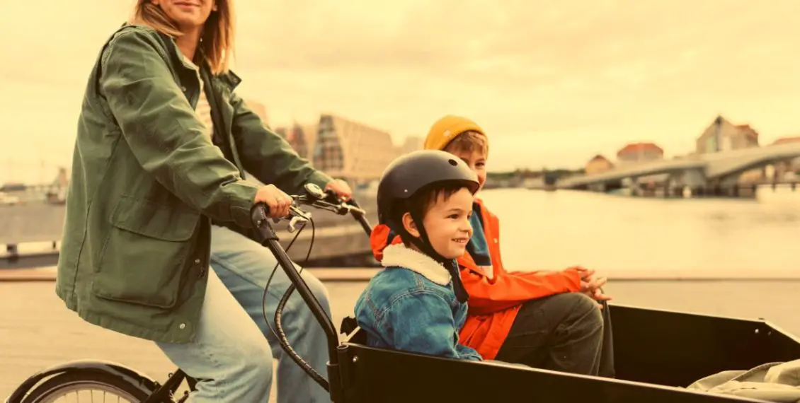 mother and children on passenger e-bike