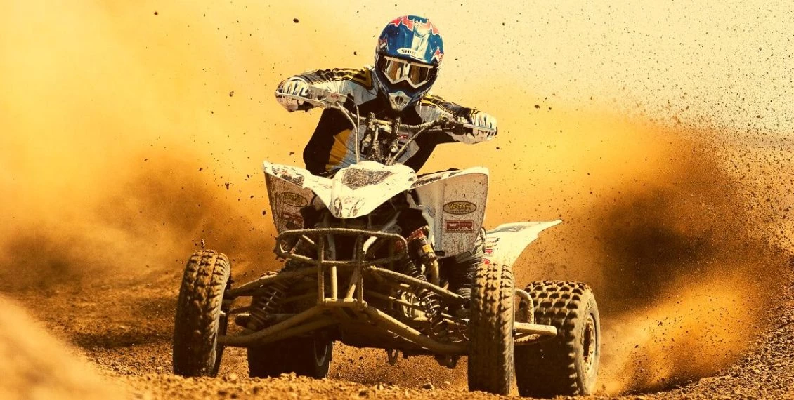 man riding atv