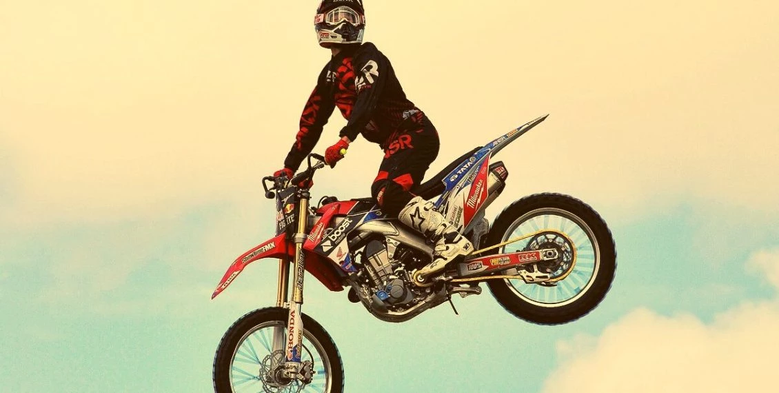 man riding dirt bike